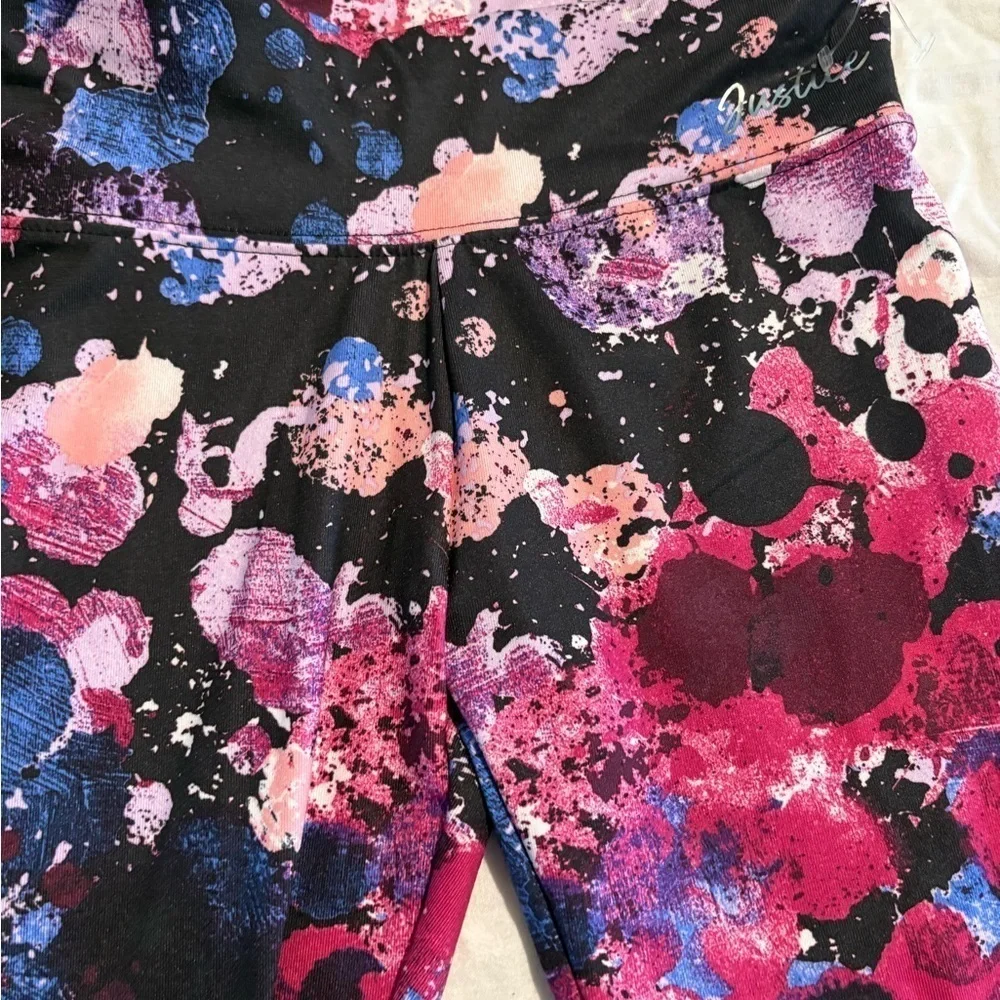 Justice Splatter Print Leggings in Pink, Purple, and Blue